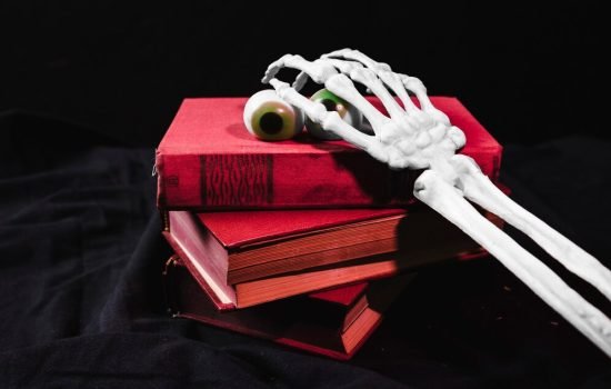 halloween concept with toy eyes skeleton arm 23 2147905860